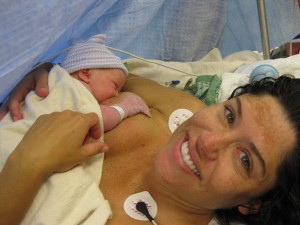 baby and mom in the operating room right after delivery